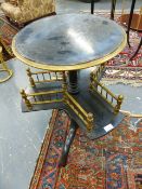 A VICTORIAN EBONISED AESTHETIC REVOLVING WORK TABLE.