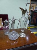 THREE VARIOUS CLARET JUGS WITH SILVER PLATED MOUNTS.