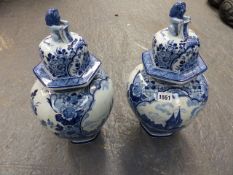 A PAIR OF DELFT STYLE HEXAFOIL BALUSTER VASES WITH COVERS. H.36cms. AND A WEDGWOOD MONOCHROME BOWL