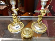 A PAIR OF NAUTICAL THEMED ANCHOR AND ROPE FORM CANDLESTICKS AND A SMALL BOX DEPICTING NELSON. (3)