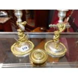 A PAIR OF NAUTICAL THEMED ANCHOR AND ROPE FORM CANDLESTICKS AND A SMALL BOX DEPICTING NELSON. (3)