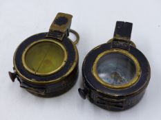 FOUR VARIOUS MARCHING COMPASSES DATED 1940,1943, ONE BAKELITE AND THE LAST DATED 1916, IT'S