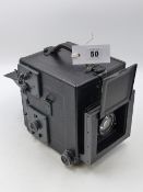 A GOOD KODAK RB GRAFLEX 1/4 PLATE CAMERA IN ORIGINAL TRANSIT CASE WITH INSTRUCTIONS AND FILM PACK.