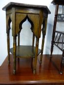 A SMALL OCTAGONAL ARTS AND CRAFTS OCCASIONAL TABLE IN THE MANNER OF LIBERTYS.