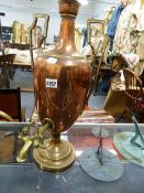 A VICTORIAN COPPER TWIN HANDLE URN MOUNTED AS A LAMP. OVERALL H.59cms.