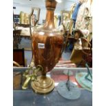 A VICTORIAN COPPER TWIN HANDLE URN MOUNTED AS A LAMP. OVERALL H.59cms.