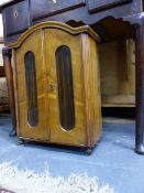 AN ANTIQUE WALNUT MINIATURE WARDROBE. H.51cms.