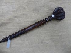 AN INTERESTING TRIBAL TURNED AND CARVED WOODEN CLUB, POSSIBLE FIJIAN.