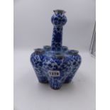 A CHINESE BLUE AND WHITE TULIP VASE DECORATED WITH FLOWER HEADS AND SCROLLING FOLIAGE. H.23.5cms.