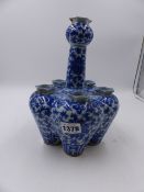 A CHINESE BLUE AND WHITE TULIP VASE DECORATED WITH FLOWER HEADS AND SCROLLING FOLIAGE. H.23.5cms.