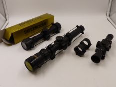 A RHINO 10 x 26 TELESCOPIC SIGHT TOGETHER WITH TWO FURTHER SIGHTS AND A PAIR OF MOUNTS.