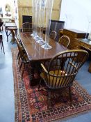 A SET OF SIX 19th.C.STYLE BEECH AND ELM WINDSOR STICK BACK DINING HAIRS TO INCLUDE TWO ARMCHAIRS.