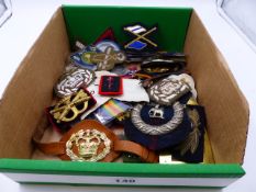 A COLLECTION OF WWII MEDALS, VARIOUS UNIFORM AND CAP BADGES,ETC.
