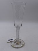 AN EARLY 19th.C. ALE GLASS WITH ACID ETCHED HOP DECORATIONS AND WHITE OPAQUE SPIRAL STEM. H.17cms.