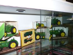 SIX DIE CAST MODELS OF JOHN DEERE TRACTORS AND A VANGUARDS BOXED TRUCK SET.