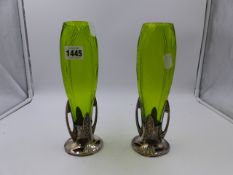 A PAIR OF ART NOUVEAU GREEN GLASS OVOID VASES WITH METAL BASES. W.M.F 514A. H.24cms.