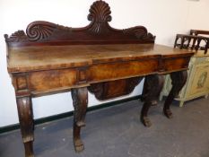 AN IMPRESSIVE WILLIAM IV IRISH CARVED MAHOGANY SERVING TABLE WITH SHAPED GALLERY BACK, THREE APRON