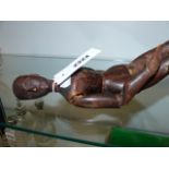 A 19th.C.CARVED PINE ARTIST'S LAY FIGURE WITH ARTICULATED LIMBS. H.36cms APPROX.