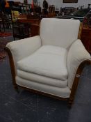 A LARGE FRENCH CARVED GILTWOOD LOUIS XVI STYLE GENTLEMAN'S LIBRARY ARMCHAIR.