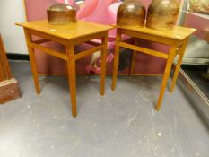 A PAIR OF ARTS AND CRAFTS OAK OCCASIONAL TABLES IN THE MANNER OF EDWARD BARNSLEY. THE TOPS 47 x