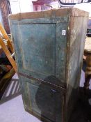 AN ANTIQUE IRON BOUND PINE CAMPAIGN CABINET.