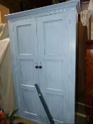 A LARGE ANTIQUE PAINTED PINE PANEL DOOR LARDER CUPBOARD WITH SHELVED INTERIOR. W.144 x H.231cms.