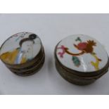 TWO CHINESE FAMILLE ROSE MOUNTED WHITE METAL DRESSER BOXES.