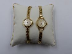 A 9ct YELLOW GOLD LADIES MANUAL WOUND OMEGA WATCH, INSIDE CASE STAMPED 77824 AND 11954, OMEGA