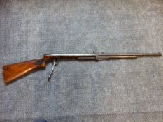 A BSA UNDER LEVER AIR RIFLE IN .22 CALIBRE, SERIAL No.T875