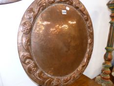 A GOOD ARTS AND CRAFTS COPPER NEWLYN CHARGER BY JOHN PEARSON WITH JP MONOGRAM TO REAR. Dia.56cms.