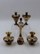 A PAIR OF ROYAL STAFFORDSHIRE MINIATURE VASES. H.5cms AND FOUR MINIATURE VASES. H. 7cms (2). 7.5 &