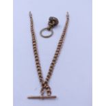 A VICTORIAN ROSE GOLD FACETED ROLLERBALL DOUBLE ALBERT CHAIN COMPLETE WITH T-BAR, MAKERS MARK CDB