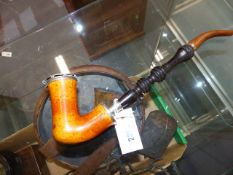 A LARGE 19th.C.MEERSCHAUM PIPE WITH TURNED COROMANDEL STEM AND COMPOSITION MOUTHPIECE, THE BOWL WITH