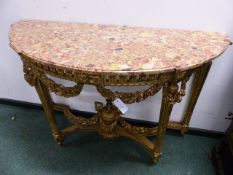 AN ANTIQUE FRENCH CARVED GILTWOOD LOUIS XVI STYLE DEMI LUNE MARBLE TOP CONSOLE TABLE WITH PIERCED