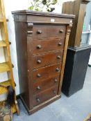 A VICTORIAN PINE WELLINGTON CHEST. W.58 x H.124cms.