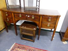 A LATE GEORGIAN MAHOGANY BOXWOD STRUNG AND CHEQUER INLAID BOW FRONT SIDEBOARD WITH FITTED CELLARETTE