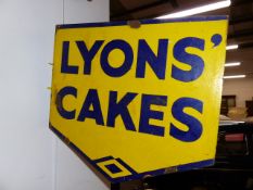 A DOUBLE SIDED ENAMEL ADVERTISING SIGN FOR LYONS CAKE AND ANOTHER FOR ALADDIN PINK PARAFFIN. (2)