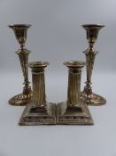 A PAIR OF SILVER HALLMARKED OVAL CANDLESTICKS WITH A HAREBELL DECORATION, DATED 1907 SHEFFIELD,