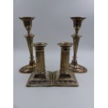 A PAIR OF SILVER HALLMARKED OVAL CANDLESTICKS WITH A HAREBELL DECORATION, DATED 1907 SHEFFIELD,