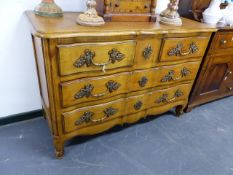 AN ANTIQUE STYLE FRENCH COMMODE CHEST OF TWO SHORT OVER TWO LONG DRAWERS WITH ELABORATE BRASS