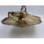 A SILVER HALLMARKED VICTORIAN INKSTAND IN THE FORM OF A LAMP ON A LILY LEAF BASE DATED 1860, LONDON.