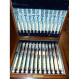 A CASED SET OF 18 PAIRS OF VICTORIAN IVORY HANDLED DESSERT KNIVES AND FORKS TOGETHER WITH A CASED