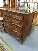 AN EARLY 18th.C. OAK CHEST OF FOUR LONG GRADUATED DRAWERS WITH GEOMETRIC PANEL DECORATION. W.104 x