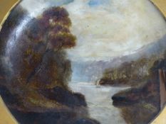 A 19th.C. OIL LANDSCAPE PAINTED ON A PLATE. 22.5cms TONDO.