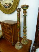 TWO PAIRS OF CARVED AND PAINTED DECORATIVE PRICKET CANDLESTICKS. LARGEST H.82cms TOGETHER WITH A