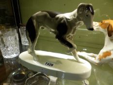 A GOLDSCHEIDER MODEL OF A RETRIEVER STAMPED BEAUME. H.19cms.