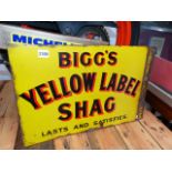 A DOUBLE SIDED ADVERTISING SIGN FOR BIGG'S YELLOW LABEL SHAG, LASTS AND SATISFIES!!