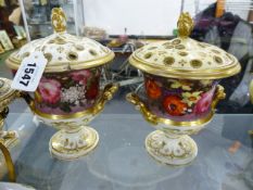 A PAIR OF DERBY STYLE TWO HANDLED CAMPANA SHAPED LIDDED VASES. H.20cms TOGETHER WITH A PAIR OF DERBY