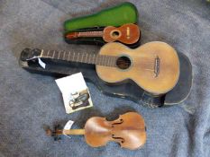 AN ANTIQUE SIX STRING GUITAR BY LACOTE, PARIS, A UKELELE BY MANUEL LOPEZ, MADRID AND A VIOLIN