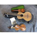 AN ANTIQUE SIX STRING GUITAR BY LACOTE, PARIS, A UKELELE BY MANUEL LOPEZ, MADRID AND A VIOLIN